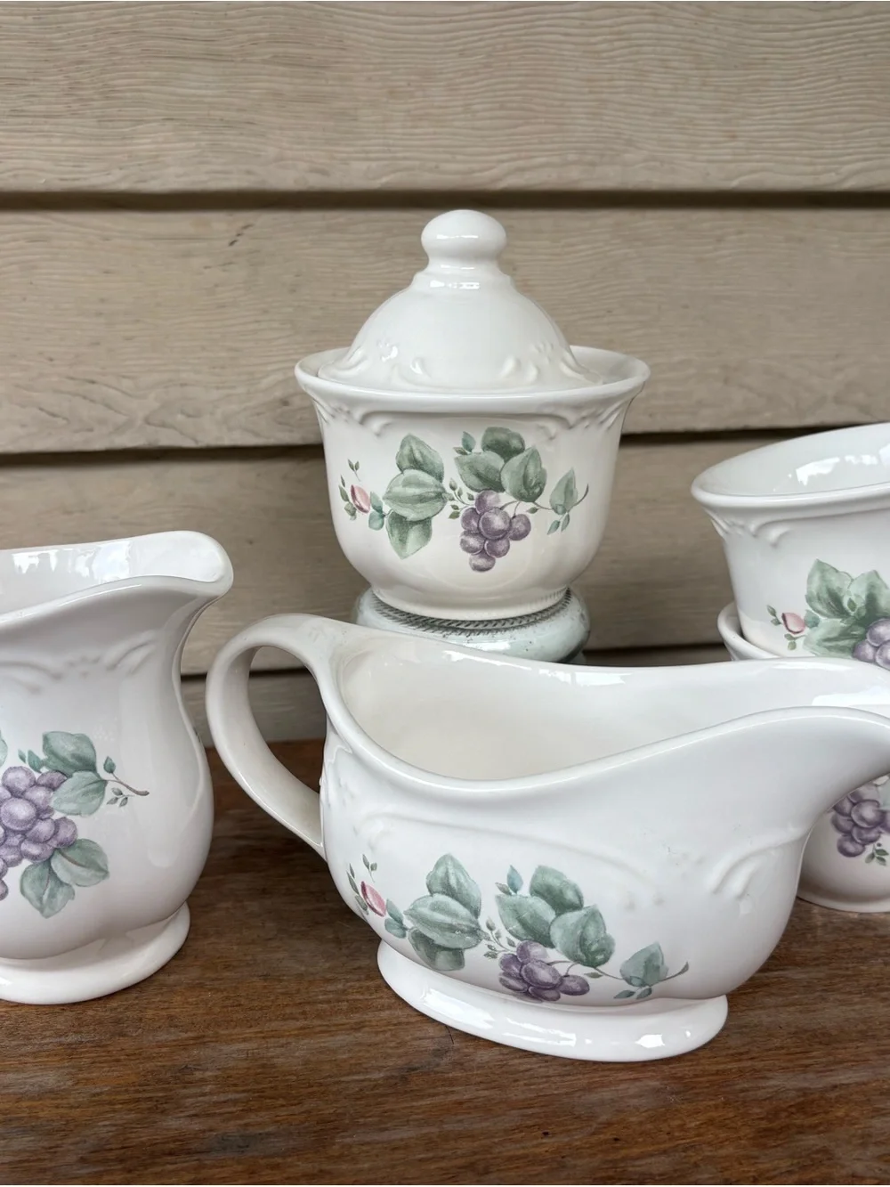 Set of Pfaltzgraff Grapevine stoneware: creamer, sugar bowl, gravy boat, 2 cups